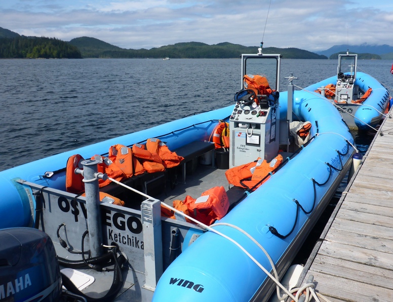 Description: Empty zodiacs at dock 